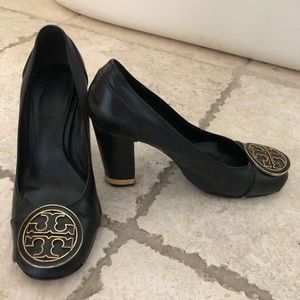 Black Tory Burch Heels with gold detail.